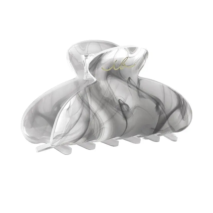 Invisibobble Clipstar My Rainboo: Unbreakable, chic claw clip for all-day hold. Stylish updos from day to night!