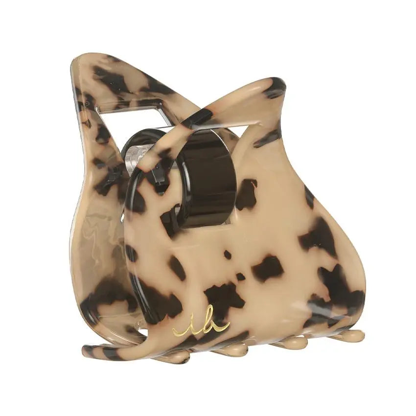 Durable Leo Love Everclaw: metal-free, strong hold, happy hair in a stylish, unbreakable accessory!