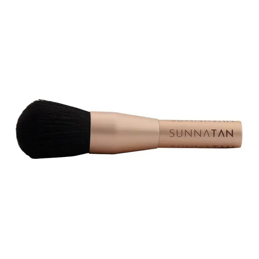 Enhance your sunless tan with PinkPro's Sunna Rose Gold Blending Brush – a must-have for flawless application and contouring!
